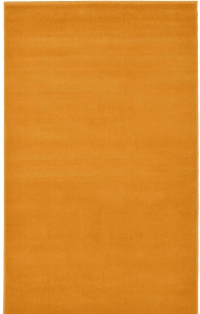 Maestro Solid Ochre Rug shown in an illustrative room