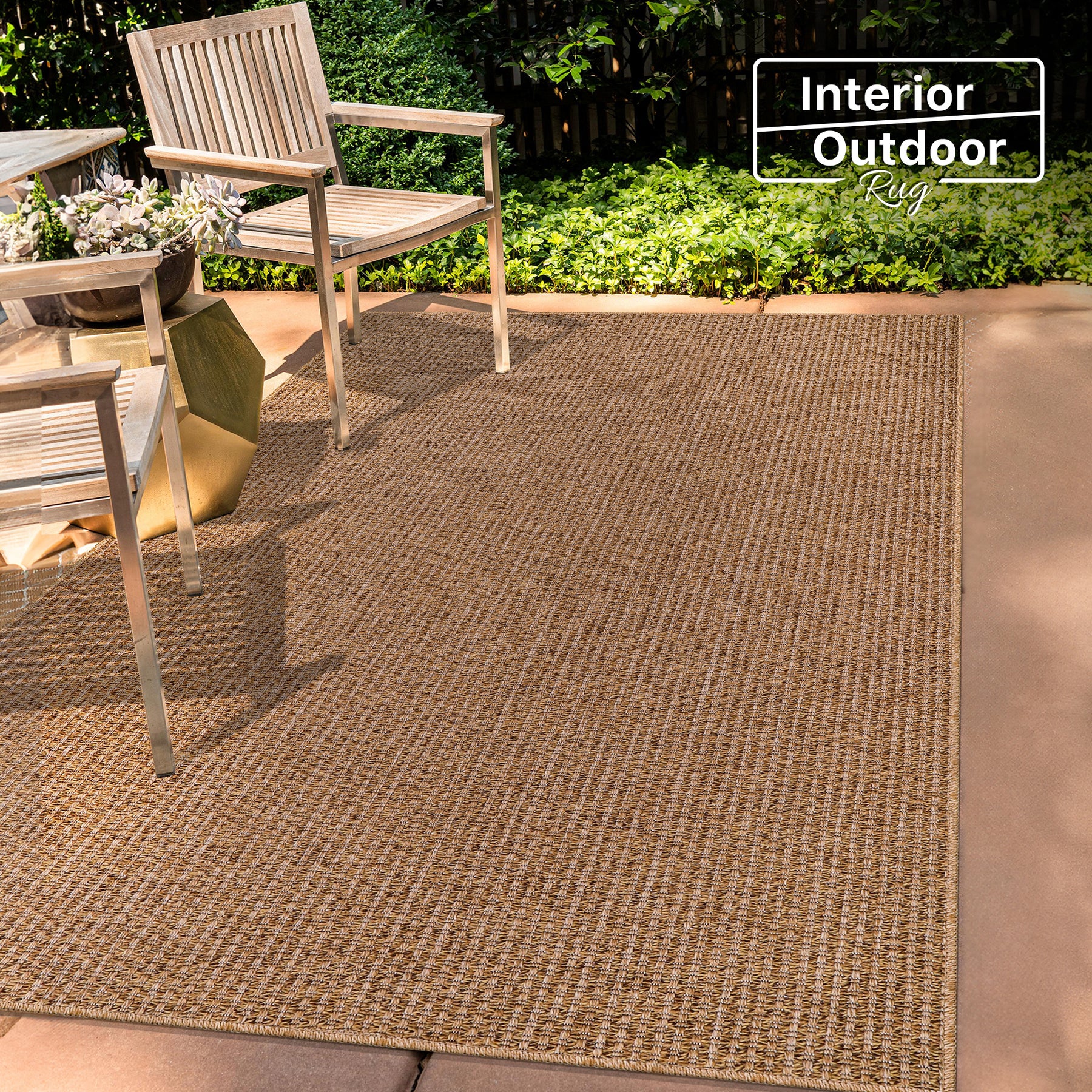 Netline Home woven jute-effect outdoor rug with basket weave texture, washable, weatherproof, non-slip backing for indoor and outdoor use.