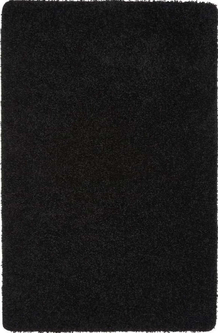 Washable Black Shaggy Rug shown in an illustrative room