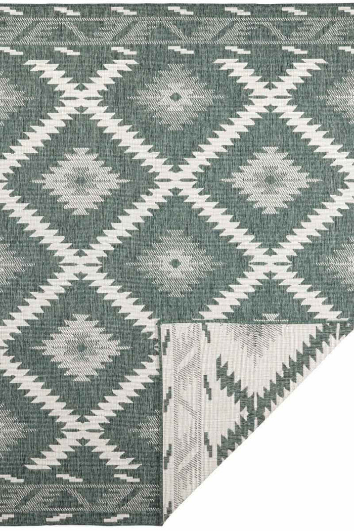 Malibu Reversible Indoor-Outdoor Rug Diamond Design shown in an illustrative room