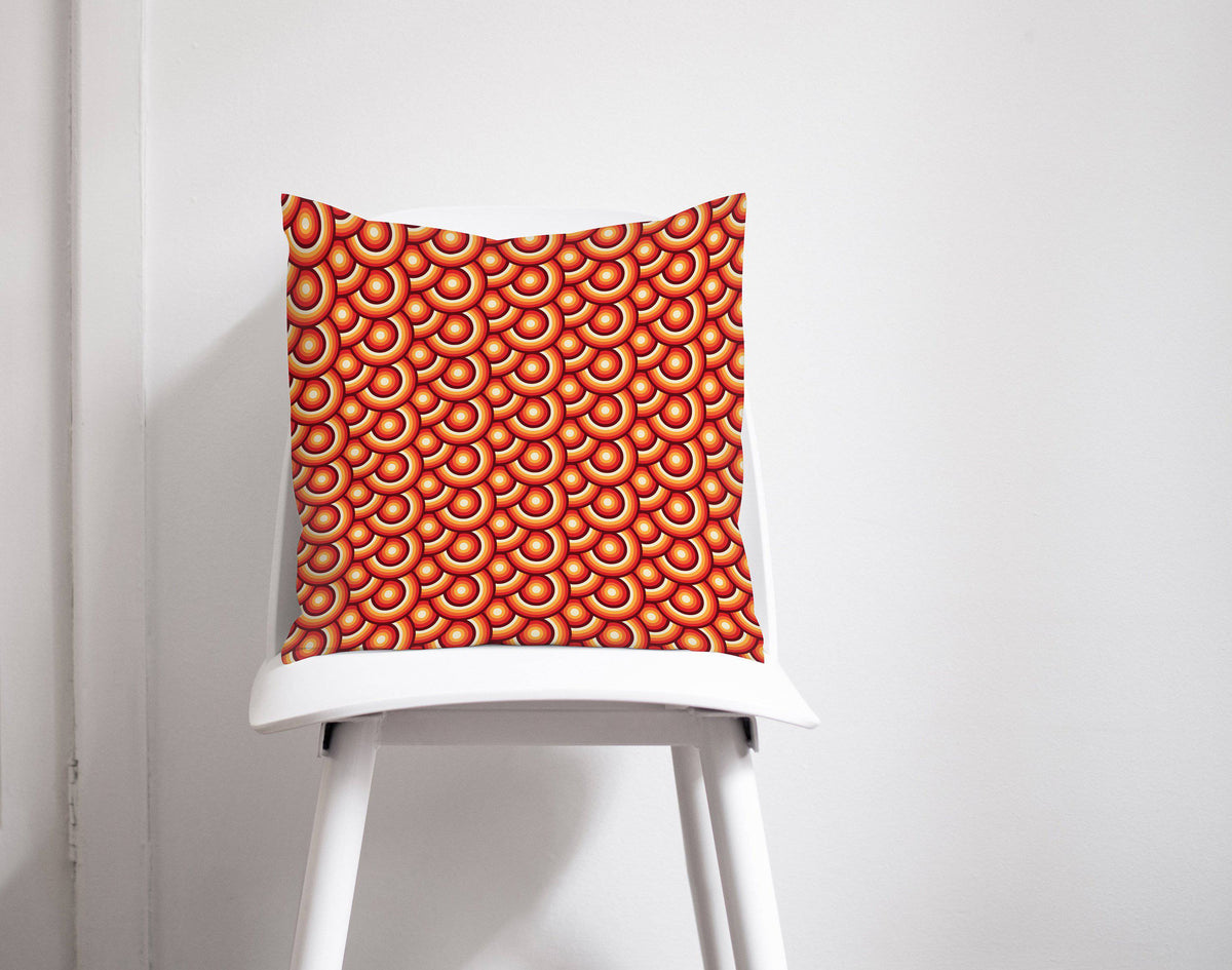 Orange Cushion with a 70's Retro Circles Design