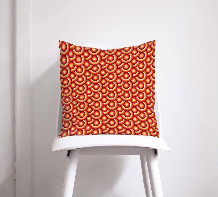 Orange Cushion with a 70's Retro Circles Design