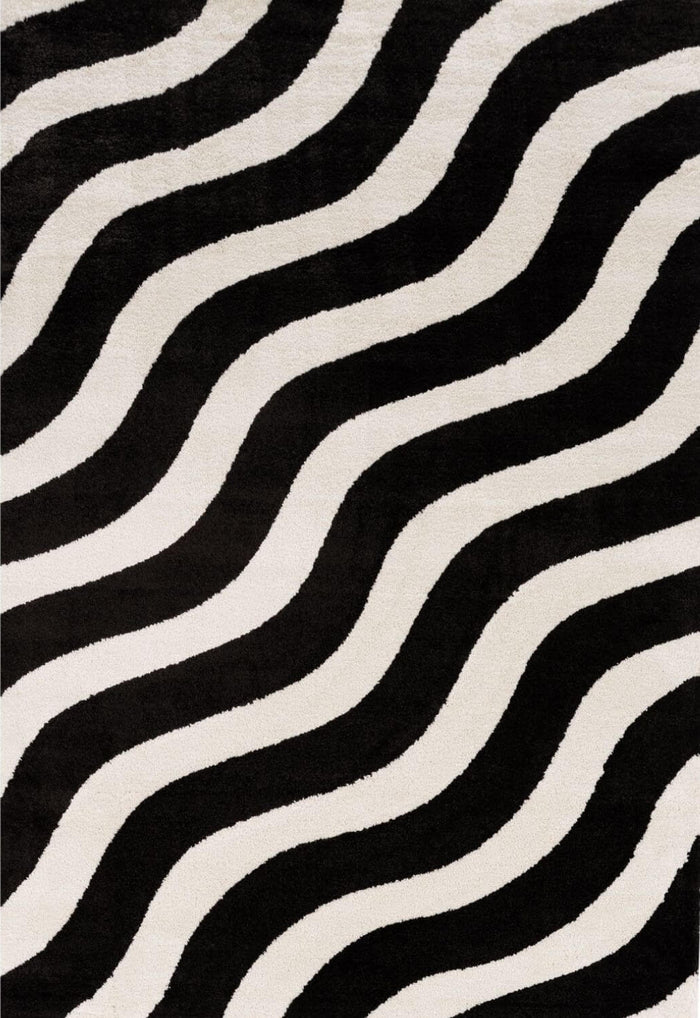 Joli Wave Black & White Rug shown in an illustrative room