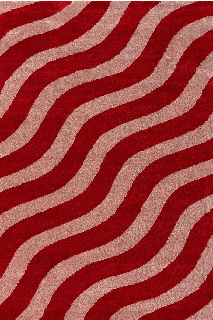 Joli Wave Red & Pink Rug shown in an illustrative room