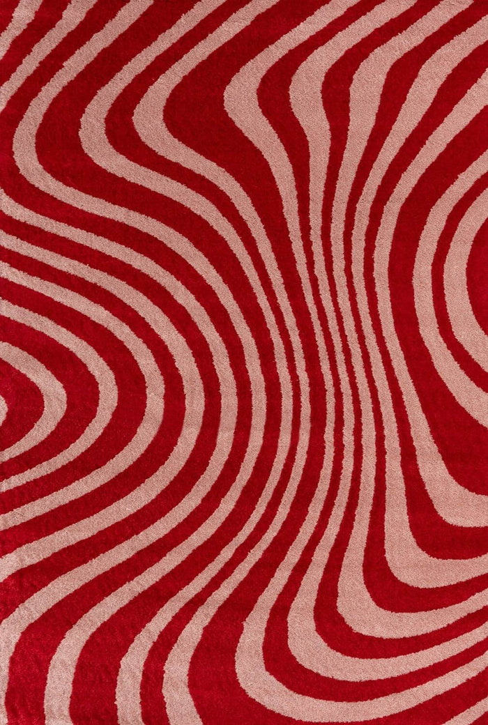 Joli Striped Red & Pink Rug shown in an illustrative room