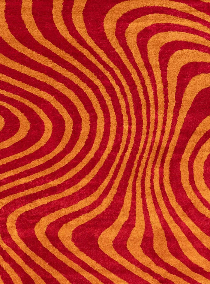 Joli Striped Red & Orange Rug shown in an illustrative room