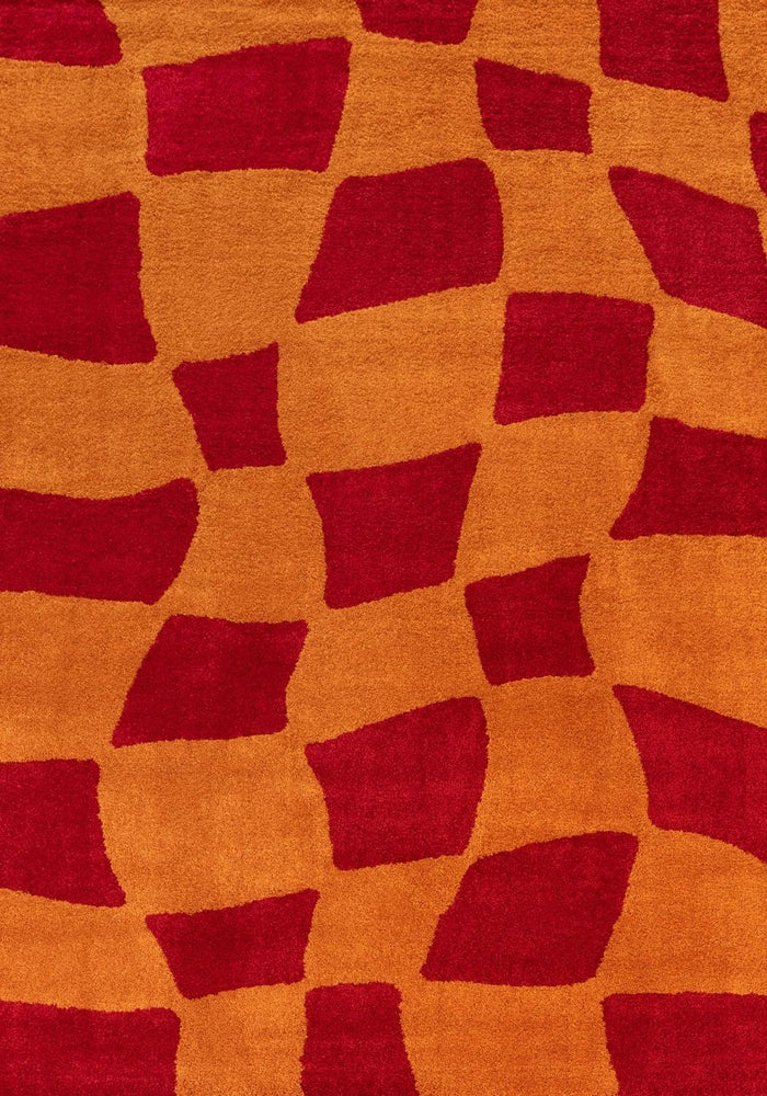 Joli Checkered Red & Orange Rug shown in an illustrative room