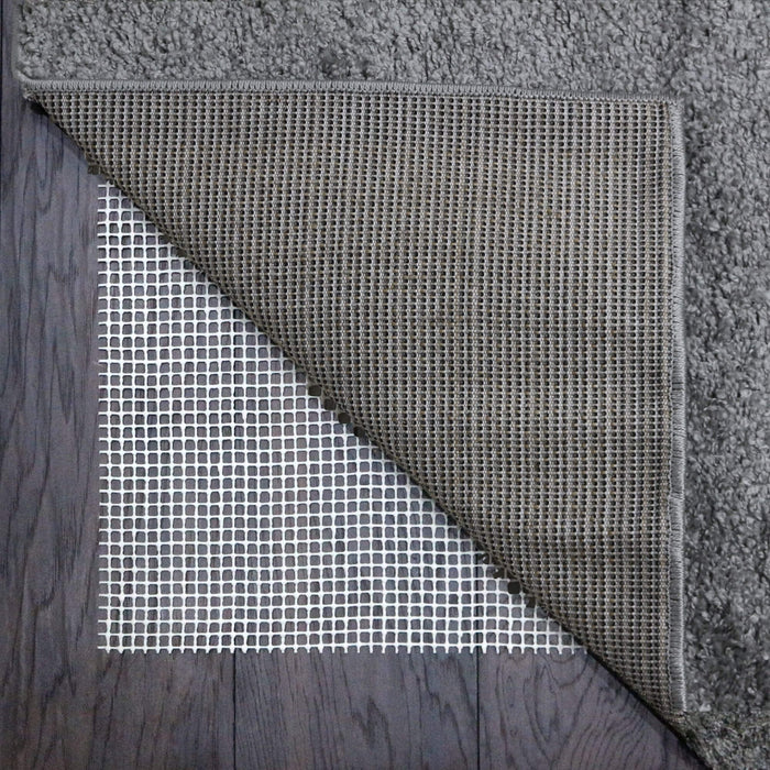 Non Slip Rug Gripper Underlay shown in an illustrative room